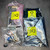 Four antistatic bags holding three circuit cards and one bag of connector hardware