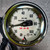 Dial close-up showing IPS-200 PRESSURE SWITCH, CLOSES ON INCR and USE NO OIL