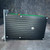 Side view of ISEL stepper driver module showing black finned aluminum heatsink and front panel