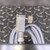 Hand holding sensor showing internally threaded process port in the hex base