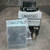 Agastat 7012EIB relay front with 60 MINUTES dial beside bagged zinc mounting plate