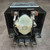 Rear view showing translucent pneumatic timing head, coil leads and terminal tabs