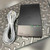 NT1U-100TC network termination unit front with STATUS and POWER LEDs and gray cord