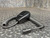 EF Johnson VM400 palm microphone with coiled cord and 13-pin connector, angled view