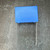 Pilkor WK9609 film capacitor showing blue rectangular body and radial wire leads.