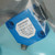 Factory-sealed bag intact; label reads LRS-3031-304, S/N 1234960 E, 10–36VDC, NPN wiring: Brown/Blue/Black OUT NO.