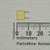 Yellow box body approx. 7mm wide; both radial leads straight and unformed. No visible body markings on this face.