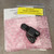 BDN6676 adapter with intact PTT latch, black textured body, no visible wear; includes original manual and anti-static bubble wrap in sealed poly bag.