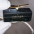 Black molded body with brass lever actuator; marked 15A 125/250/480VAC, 1/2A 125VDC, 1/4A 250VDC, code L96. Leads attached.