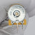 Metal back face stamped 270-XS8784 and 1201 visible; yellow body with three through-hole solder lugs, no damage observed.