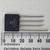 Black molded square package with four straight leads; face marked GI logo, 9120, and KBL02; plus symbol visible on lower corner; leads show light oxidation.