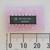 Top view of a Motorola MC74ACT04N DIP-14 integrated circuit resting on pink foam beside a scale.
