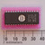 STMicroelectronics M27128AFI UV-erasable EPROM in 28-pin windowed DIP package shown with millimeter ruler.