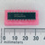 Texas Instruments SN74ALS541N DIP-20 integrated circuit shown with millimeter ruler for scale.
