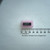 Maxim MAX510BCPE 16-pin DIP IC on pink foam beside a metric ruler.