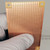 Angled view of copper trace side on Tayda IC87 prototyping board.