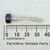 Side profile of General Instrument 2W02G bridge rectifier beside a millimeter ruler.