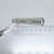 Side angled view of Century Spring W-40CS compression spring.