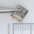 Angled view of 51140 crystal showing underside and pins.