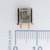 Reverse side of VARIOUS 52218 crystal showing KXN markings.