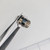 Angled view of PARTSMINE A-661 LED bezel held with tweezers.