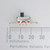 Side view of PARTSMINE A-5113 slide switch next to a metric ruler.