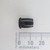 Side view of Parts Mine A-366 LED clip on a millimeter scale.