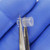 Side profile view of PARTS MINE A-7893 clear LED diffuser cap held in tweezers.