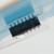 Close-up of IC chip marked ITT 491 inside the Archer 276-1701 packaging.
