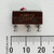 Side view of Micro Switch 11SM1-T2 showing part number and metric scale.