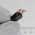 Angled view showing the metal mounting tab and body edge of IOR IRF510 transistor.