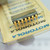 Angled view of gold-plated pins on Motorola MC790P DIP IC.