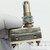 Close-up of stamped 3HT1 8414 marking on Honeywell switch.