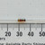 Close-up of color code bands on Unbranded R-4.3ohm-CC resistor.