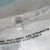 Close-up of the metal can TO-39 package and leads of the NTE NTE323 transistor.