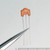 Murata DSS6NF31C223Q55B 3-terminal capacitor held in tweezers showing 223 and 16V markings.