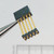 Tail pins and alignment strip on Samtec ESQT-105-02-G-D-800 connector.