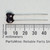 Cornell Dubilier CD15D511J03 dipped mica capacitor next to a millimeter scale.