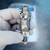 Laser markings on Baumer 11245543 level sensor housing.