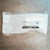 Manufacturer label on packaging for SMC SY7000-27-2T.