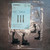 Contrinex YXW-0001-000 mounting bracket kit with documentation and hardware bag.