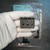 Underside view of Contrinex YXW-0001-000 base bracket.