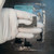 Curved clamp component from Contrinex YXW-0001-000 bracket kit.