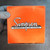 Vintage orange Simpson product box.