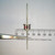 Motorola MR1031A axial diode held in tweezers against a scale.