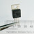 Semtech LM7805 linear voltage regulator in a 3-pin TO-220 package.