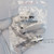 Sealed factory package for Amphenol RFX 31-321-10RFX BNC crimp plug showing printed specifications.