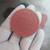 Abrasive face of a 2-inch 3M Roloc sanding disc.