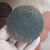 Surface of a blue non-woven 3M Roloc conditioning disc.