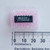 Top view of a MYSON MTV021N-25 IC on pink foam next to a millimeter ruler.
